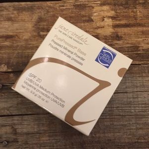 Jane Iredale pressed powder in compact.